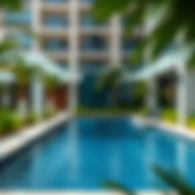 Swimming Pool Area at The Bay Residence Elegant swimming pool area surrounded by lush landscaping at The Bay Residence